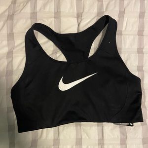 NEW WITH TAGS. Nike Sports Bra. Size medium. Black.